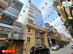 toa-nha-van-phong-319-321-quang-trung